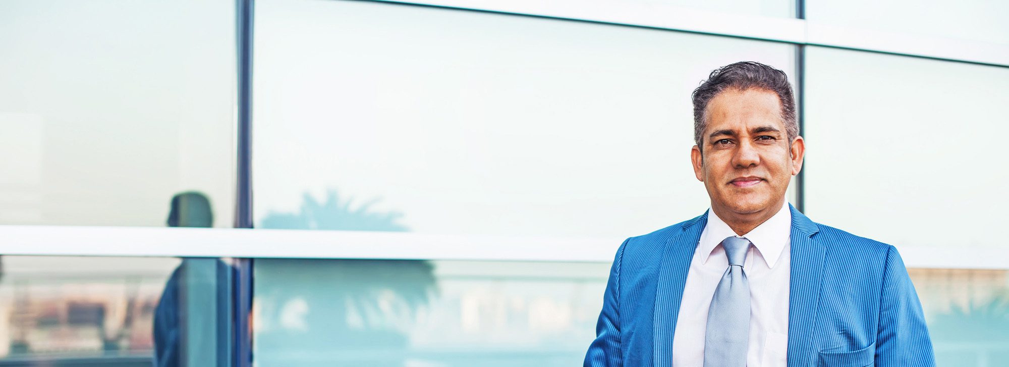 Man Wearing A Blue Suit